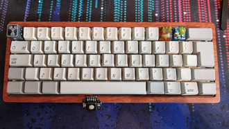 Clueboard 60; SKCM Brown;  Apple M0113 Caps